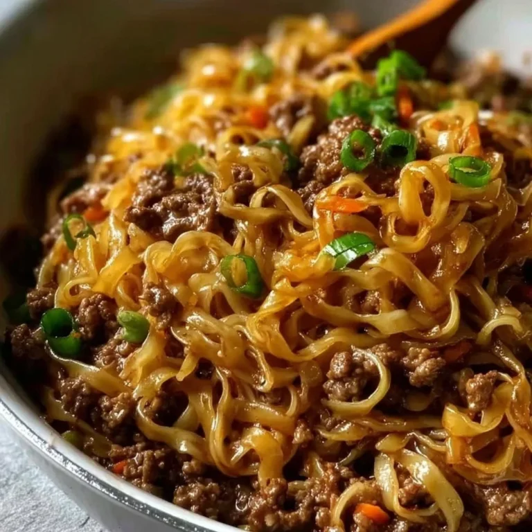 Delicious bowl of Mongolian Ground Beef Noodles topped with green onions