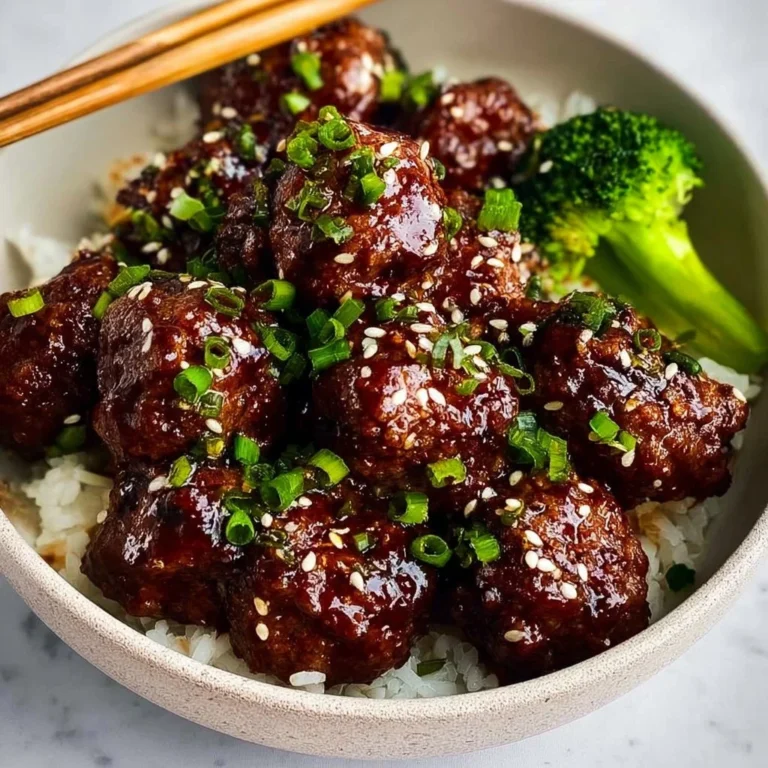 Delicious sticky Mongolian beef meatballs garnished with green onions.
