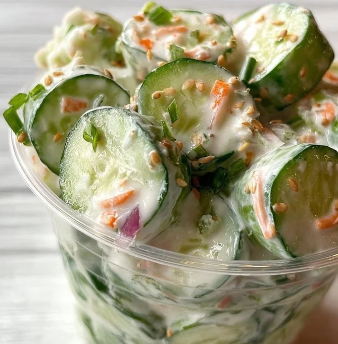 Creamy cucumber sushi salad with fresh ingredients served in a bowl