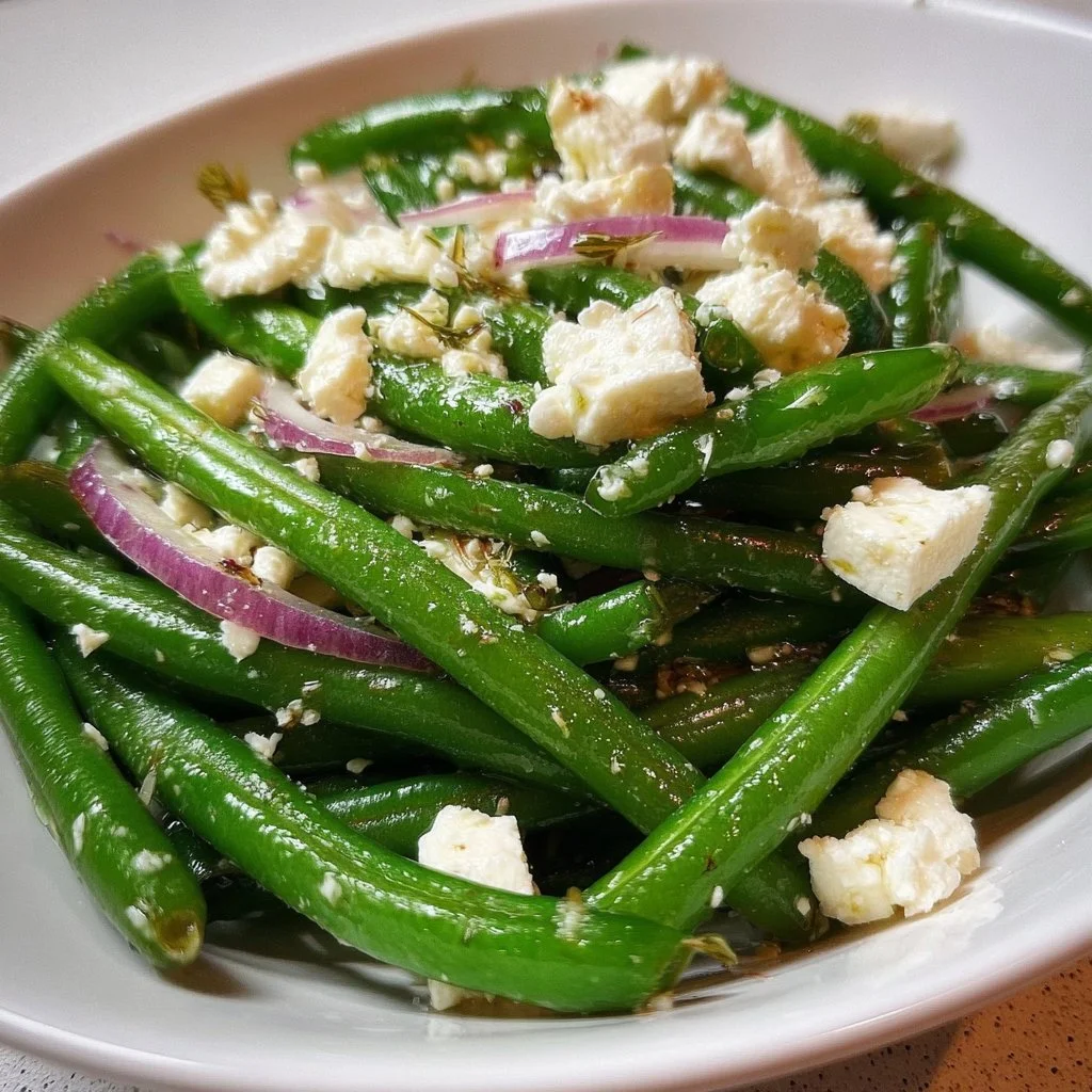 Fresh green bean and feta salad with vibrant vegetables